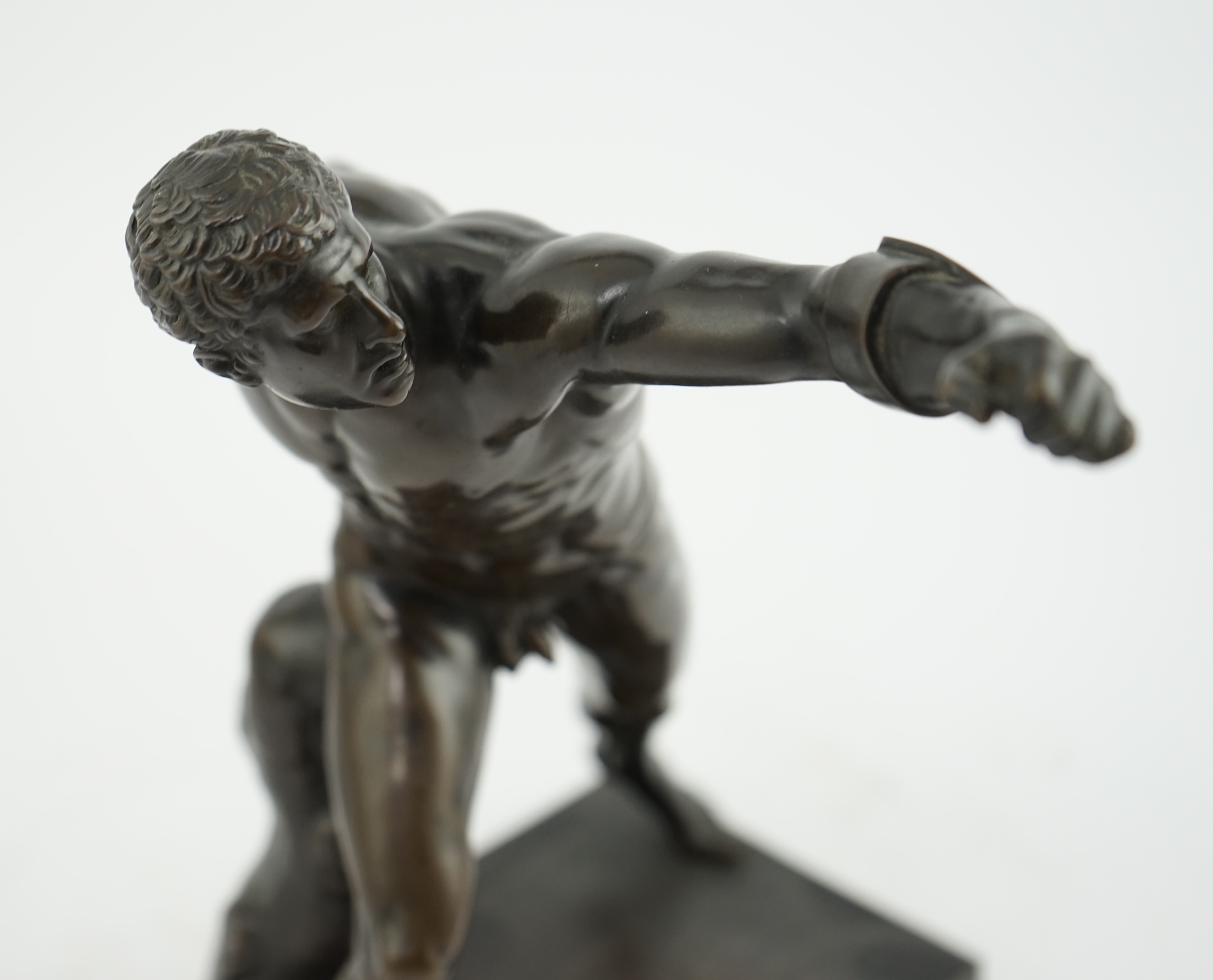 A late 19th century French patinated bronze model of the Borghese Gladiator, after the Antique